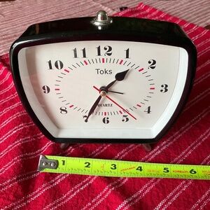 Black metal alarm clock